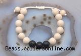 CGB6670 10mm round white fossil jasper & black lava adjustable bracelets