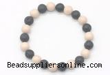 CGB8073 8mm white fossil jasper & black lava beaded stretchy bracelets