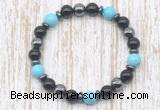 CGB8379 8mm blue howlite, black onyx & hematite energy bracelet