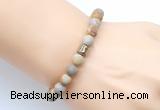 CGB9318 8mm, 10mm matte fossil coral & drum hematite power beads bracelets