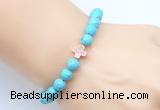 CGB9352 8mm, 10mm blue howlite & cross hematite power beads bracelets