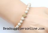 CGB9360 8mm, 10mm white fossil jasper & cross hematite power beads bracelets