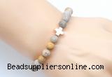 CGB9434 8mm, 10mm matte fossil coral & cross hematite power beads bracelets