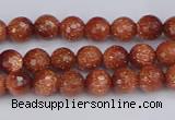 CGS470 15.5 inches 4mm faceted round goldstone beads wholesale