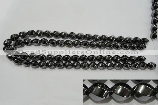 CHE166 15.5 inches 10*12mm twisted rice hematite beads