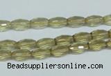 CLQ10 15.5 inches 6*10mm faceted rice natural lemon quartz beads