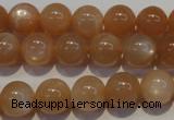 CMS703 15.5 inches 10mm round peach moonstone beads wholesale