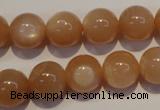 CMS704 15.5 inches 12mm round peach moonstone beads wholesale