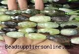 CRI116 15.5 inches 10*30mm faceted rice green garnet beads