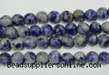 CRO771 15.5 inches 6mm faceted round blue spot stone beads wholesale