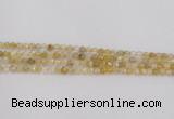 CRU666 15.5 inches 4mm faceted round golden rutilated quartz beads