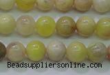 CSS600 15.5 inches 4mm round yellow sunstone gemstone beads