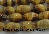 CTE1516 15.5 inches 8*12mm rice golden tiger eye beads wholesale