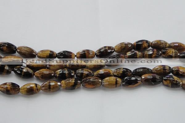 CTE1581 15.5 inches 10*14mm faceted rice yellow tiger eye beads