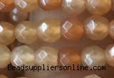 CTG2519 15.5 inches 4mm faceted round red aventurine beads