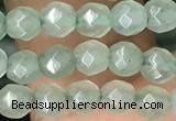 CTG2521 15.5 inches 4mm faceted round green aventurine beads