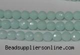 CTU2572 15.5 inches 6mm faceted round synthetic turquoise beads