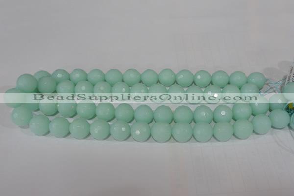 CTU2577 15.5 inches 16mm faceted round synthetic turquoise beads