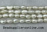 FWP285 15 inches 9mm - 10mm baroque white freshwater pearl strands